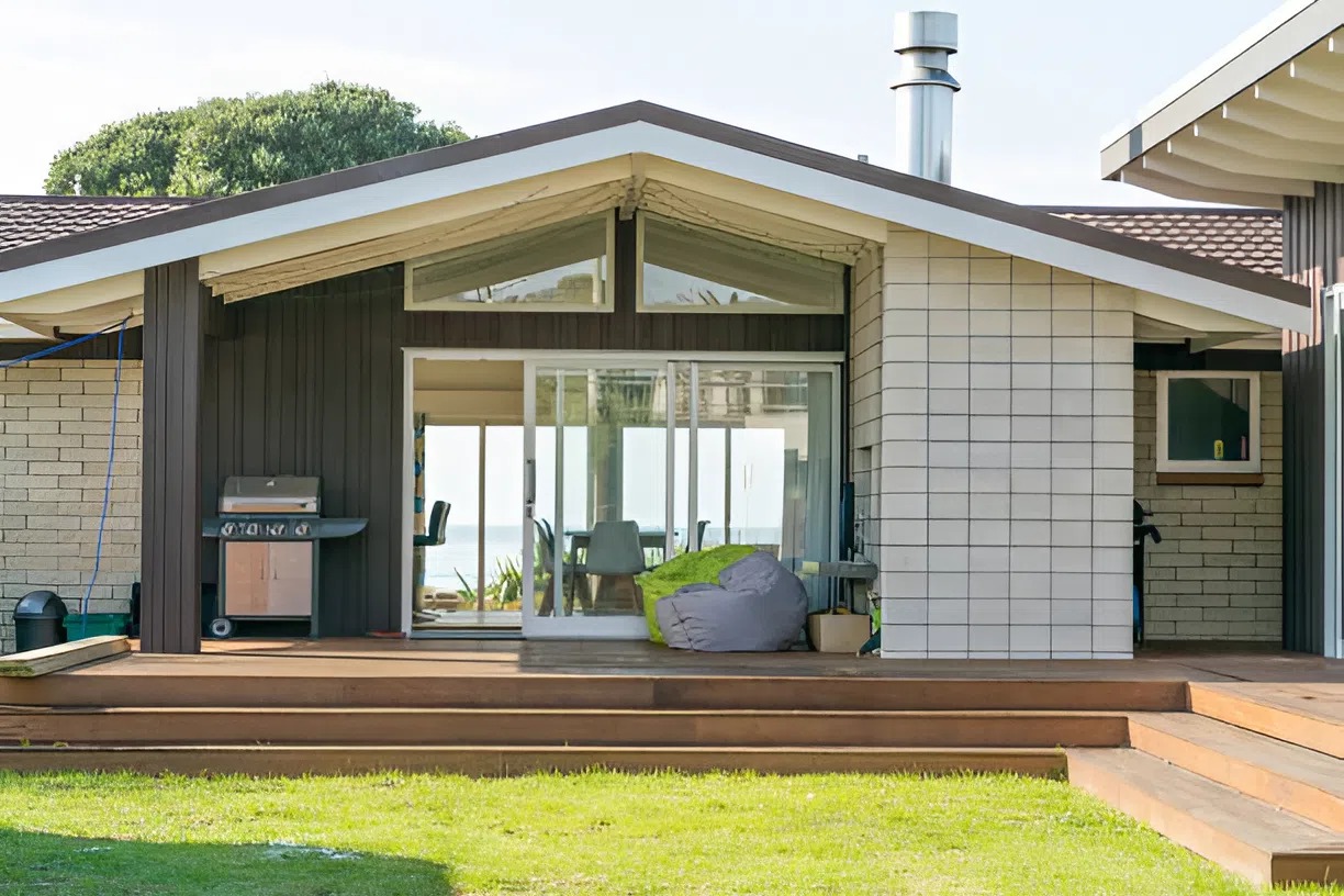 Home exterior with clean siding and a well-maintained deck by an exterior painter in Grover Beach, CA.