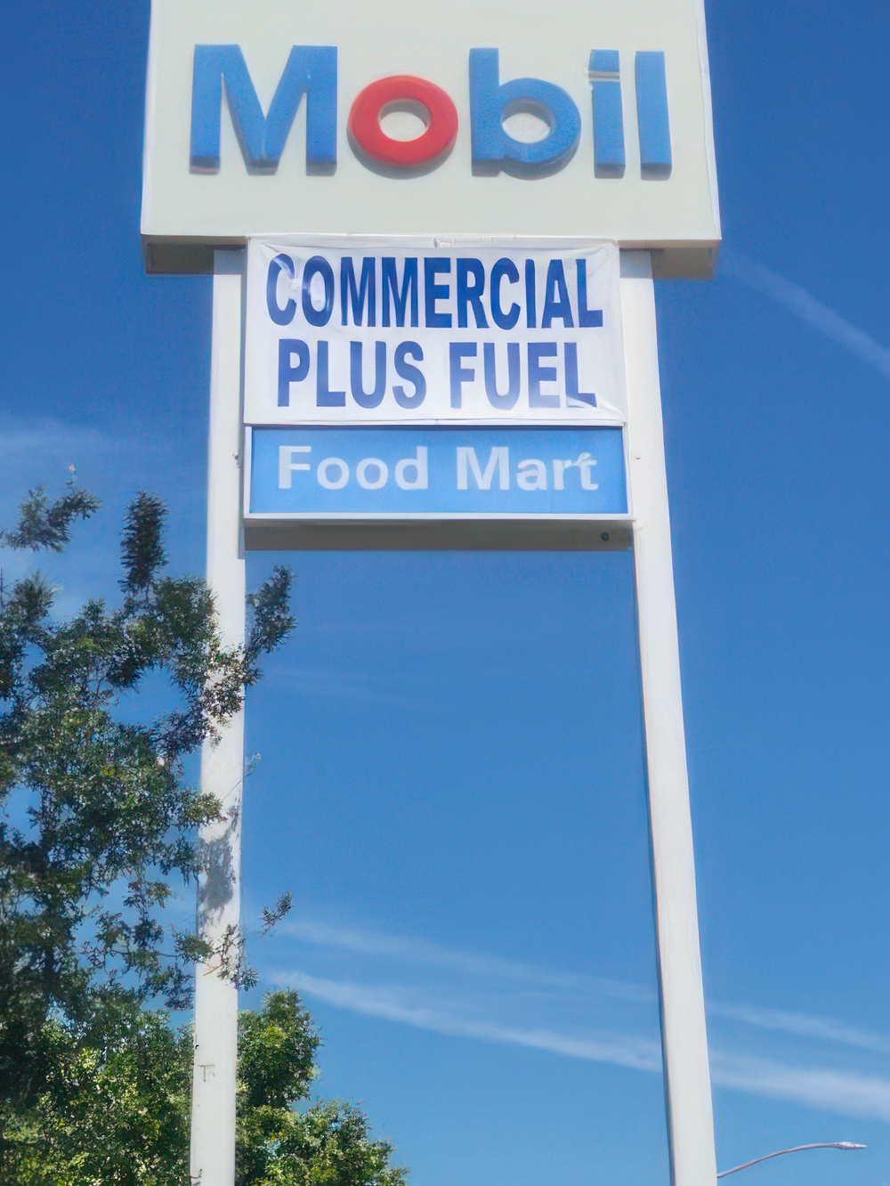 Mobil Food Mart commercial signage close-up painting Mobil Food Mart signage close-up