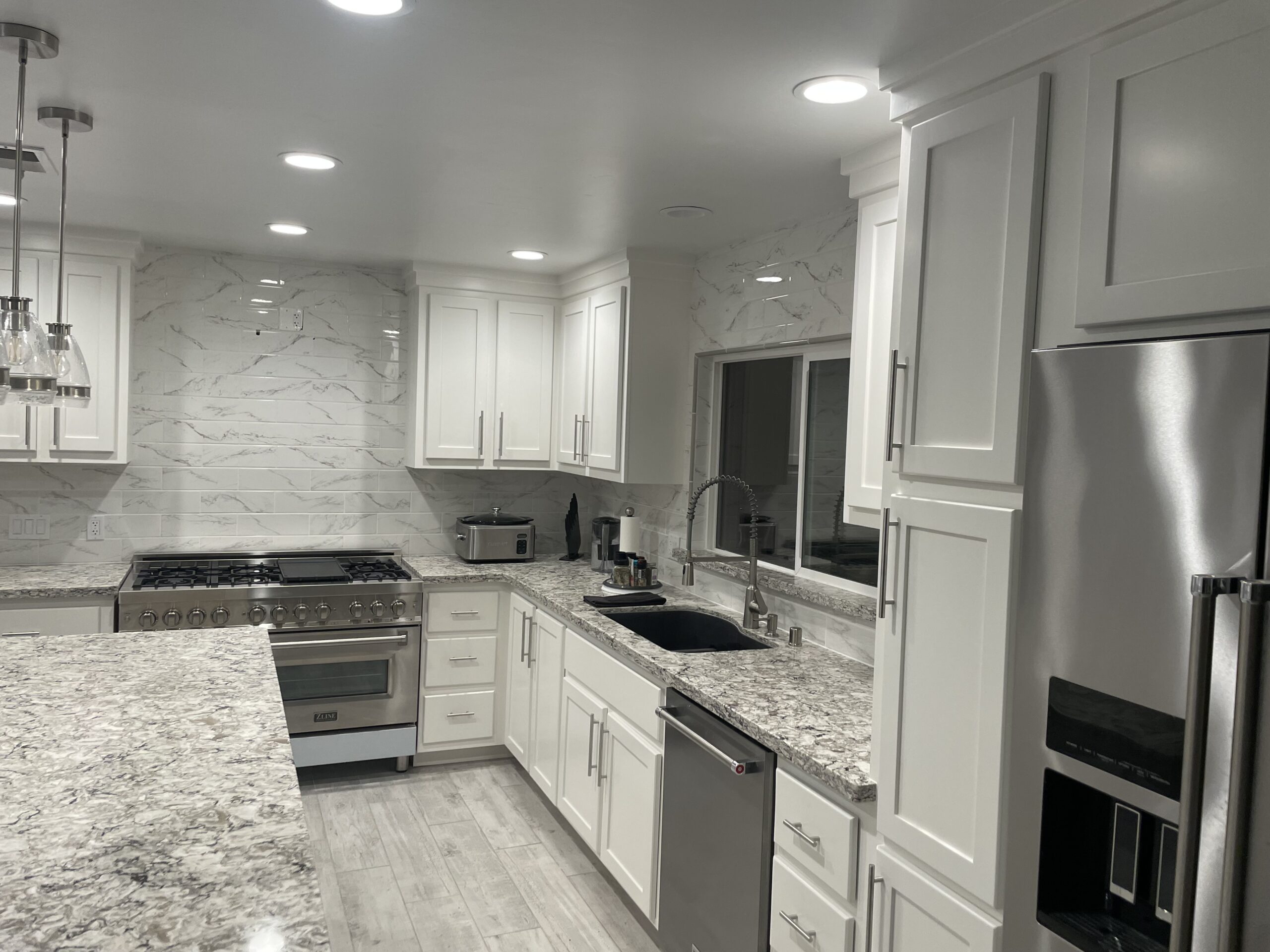 White modern kitchen cabinet refinishing project White modern kitchen cabinet refinish