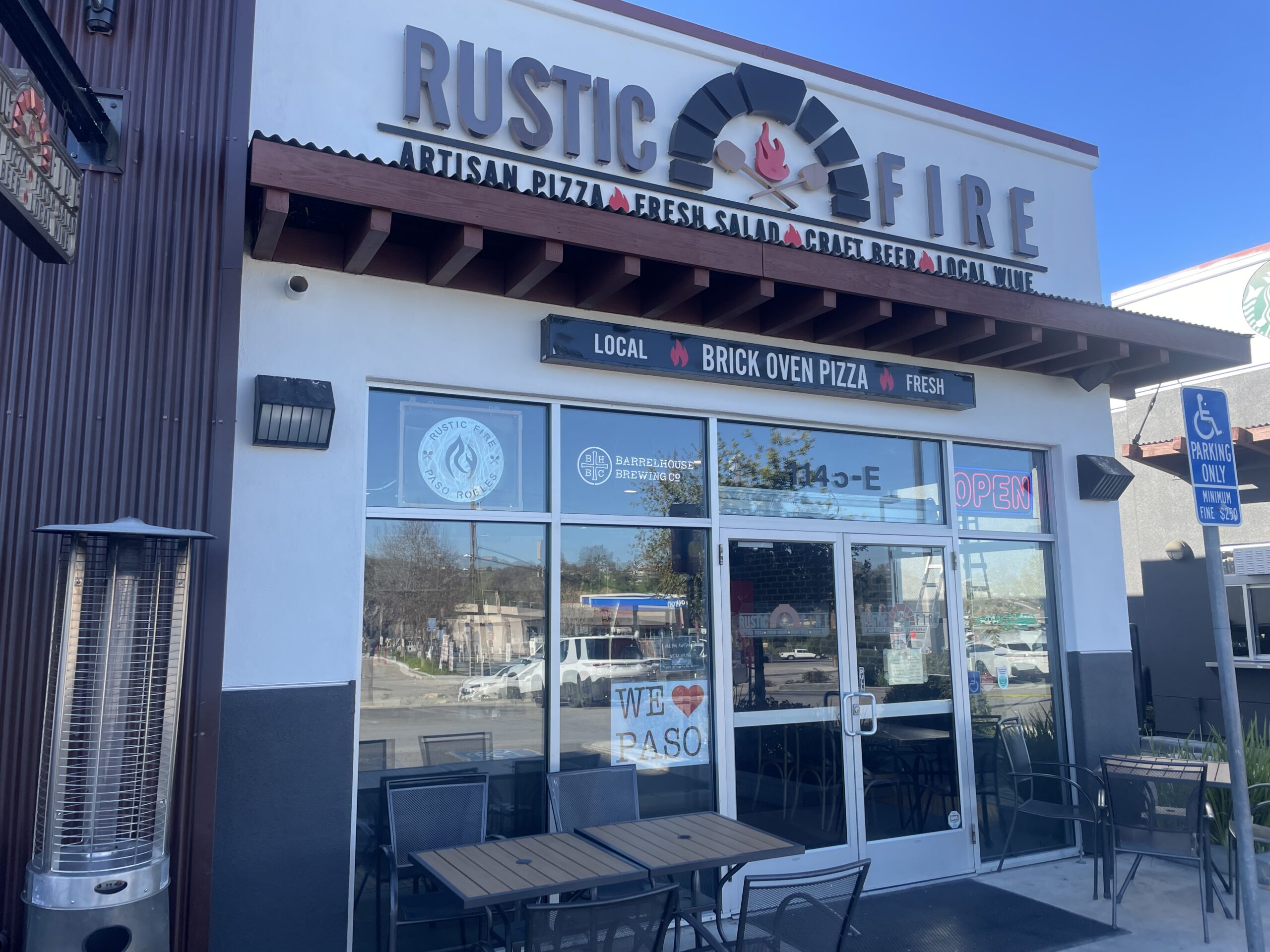 Restaurant Exterior Commercial Painting Services Clean and inviting exterior of Rustic Fire pizza restaurant, showcasing professional commercial painting.