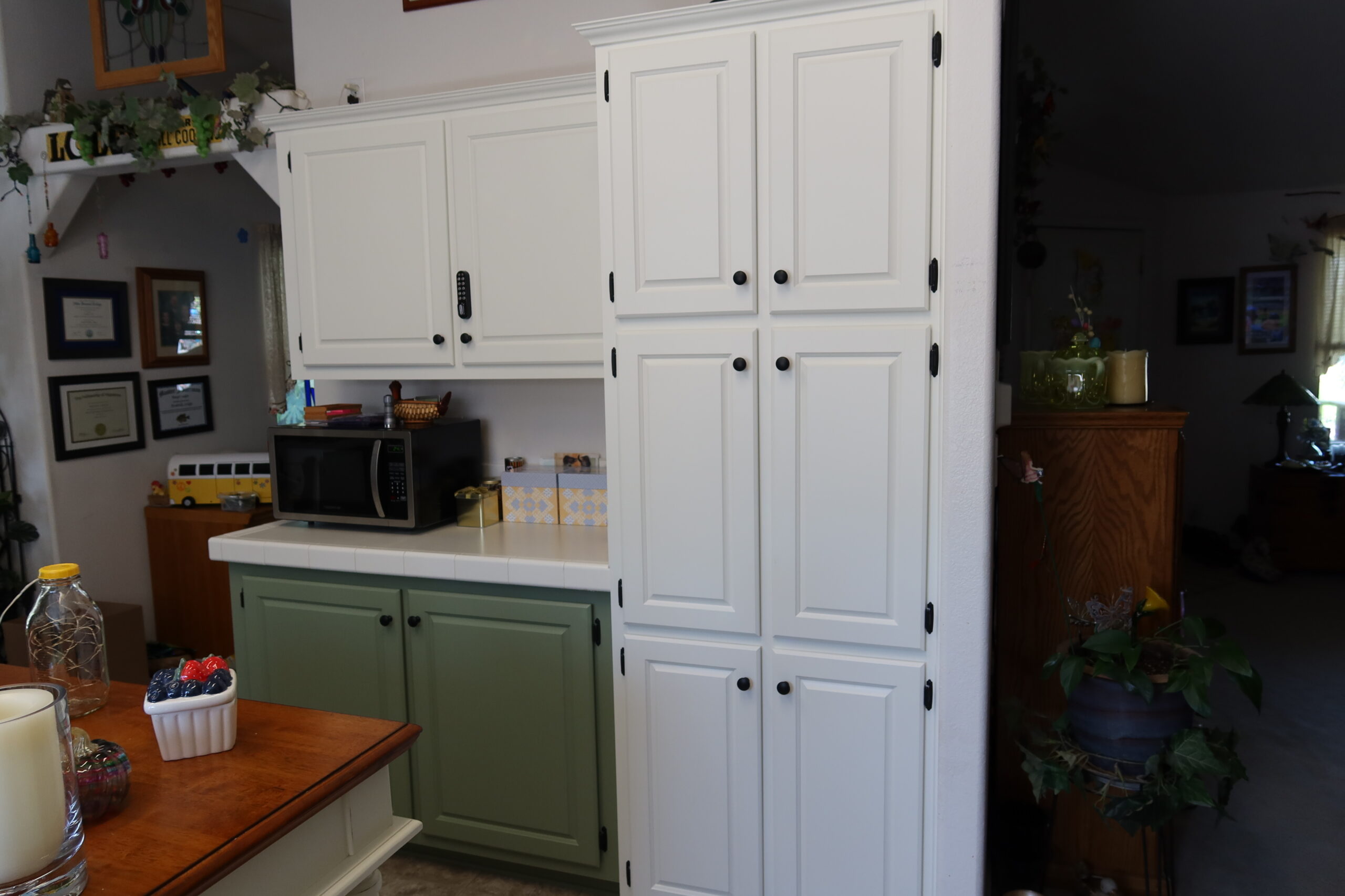 Tall white pantry cabinet refinishing project Tall white pantry cabinet refinish